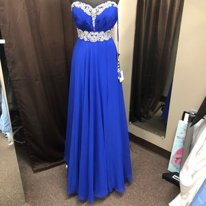 Price lowered Royal Blue Formal Giwn with clusters of Rhinestones